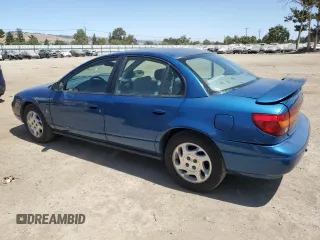 2000 Saturn SL with VIN 1G8ZK5271YZ184701, listed as a Copart auction lot 61598135 with 123,309 mi miles and Salvage title. Bid and sale history available at DreamBid. Image 2.