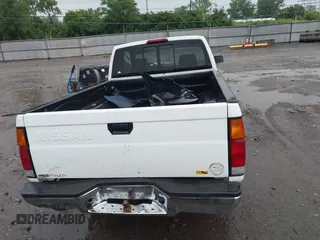 1995 Nissan Frontier XE with VIN 1N6SD16S5SC350962, listed as a IAAI auction lot 42216026 with 156,163 mi miles and . Bid and sale history available at DreamBid. Image 16.