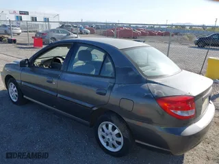 2004 Kia Rio with VIN KNADC125246339415, listed as a IAAI auction lot 41978078 with 127,727 mi miles. Bid and sale history available at carsss.com. Image 3.