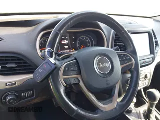 2015 Jeep Cherokee Limited with VIN 1C4PJMDS1FW533060, listed as a IAAI auction lot 41796305 with 199,175 mi miles and . Bid and sale history available at DreamBid. Image 11.