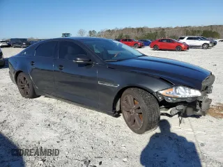 2012 Jaguar XJ with VIN SAJWA1CB1CLV31450, listed as a Copart auction lot 46883875 with 150,268 mi miles and Salvage Title. Bid and sale history available at DreamBid. Image 4.