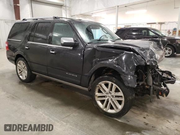 2015 Ford Expedition Platinum with VIN 1FMJU1MT5FEF18003, listed as a Copart auction lot 50179905 with 127,758 mi miles and Salvage title. Bid and sale history available at DreamBid. Image 4.