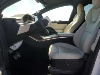 2023 Tesla Model X with VIN 7SAXCDE52PF378496, listed as a Copart auction lot 49455825 with Not Provided miles and Salvage Title. Bid and sale history available at DreamBid. Image 7.