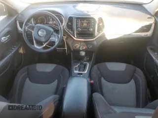 2015 Jeep Cherokee Sport with VIN 1C4PJLAB8FW663173, listed as a Copart auction lot 81185614 with 126,738 mi miles and Salvage title. Bid and sale history available at DreamBid. Image 8.