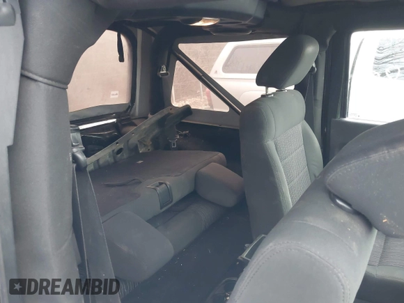 2011 Jeep Wrangler Sport with VIN 1J4AA2D18BL588273, listed as a IAAI auction lot 41857858 with 136,473 mi miles and . Bid and sale history available at carsss.com. Image 8.