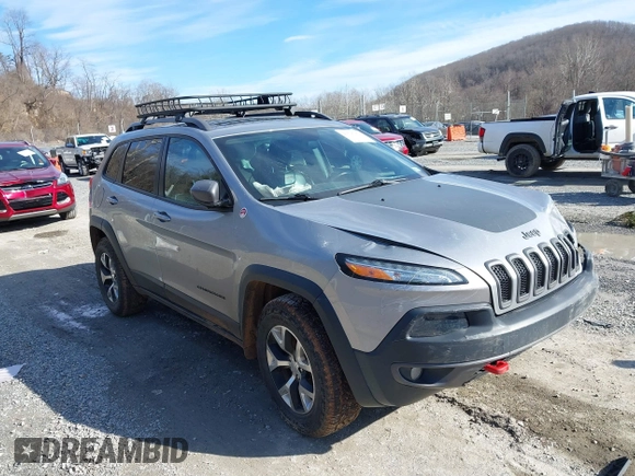 2016 Jeep Cherokee Trailhawk z VIN 1C4PJMBB6GW335837, wystawiony jako IAAI lot #41547478 z przebiegiem 236 483 mil mil oraz . Historia ofert i sprzedaży dostępna na DreamBid. Obrazek 1.