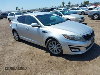 2015 Kia Optima EX with VIN 5XXGN4A73FG436223, listed as a IAAI auction lot 41970418 with 174,002 mi miles. Bid and sale history available at carsss.com. Image 1.
