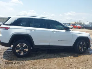 2023 Jeep Grand Cherokee with VIN 1C4RJYB63PC649000, listed as a IAAI auction lot 42306975 with 29,948 mi miles and . Bid and sale history available at DreamBid. Image 13.