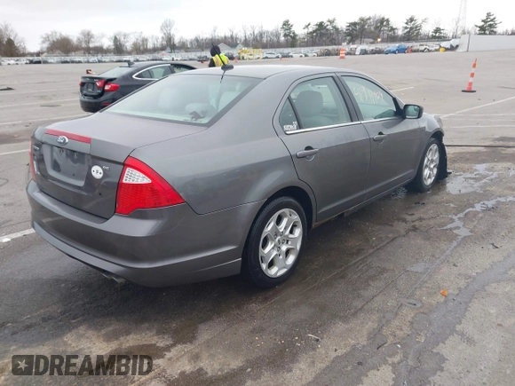 2011 Ford Fusion SE with VIN 3FAHP0HA7BR331095, listed as a IAAI auction lot 41911404 with 182,425 mi miles. Bid and sale history available at carsss.com. Image 4.