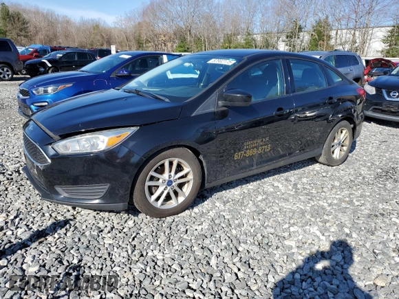 2018 Ford Focus SE with VIN 1FADP3FE9JL306394, listed as a Copart auction lot 52902175 with 77,338 mi miles and Salvage title. Bid and sale history available at DreamBid. Image 1.