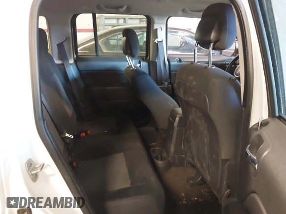 2014 Jeep Patriot Latitude with VIN 1C4NJRFB4ED864114, listed as a IAAI auction lot 41639732 with 103,119 mi miles. Bid and sale history available at carsss.com. Image 8.