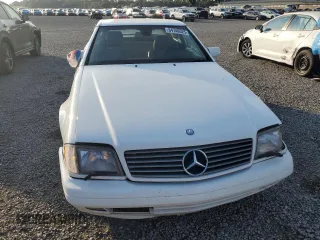 1997 Mercedes-Benz SL 500 with VIN WDBFA67FXVF149930, listed as a Copart auction lot 64749525 with 88,523 mi miles and Salvage title. Bid and sale history available at DreamBid. Image 5.