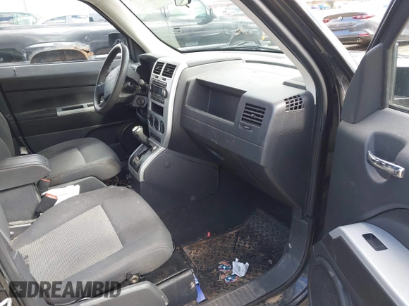 2008 Jeep Patriot Sport with VIN 1J8FF28WX8D775464, listed as a IAAI auction lot 42042232 with 158,428 mi miles and . Bid and sale history available at carsss.com. Image 5.