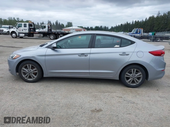 2017 Hyundai Elantra SE z VIN 5NPD84LF8HH202097, wystawiony jako IAAI lot #42283307 z przebiegiem 94 568 mil mil oraz . Historia ofert i sprzedaży dostępna na DreamBid. Obrazek 14.