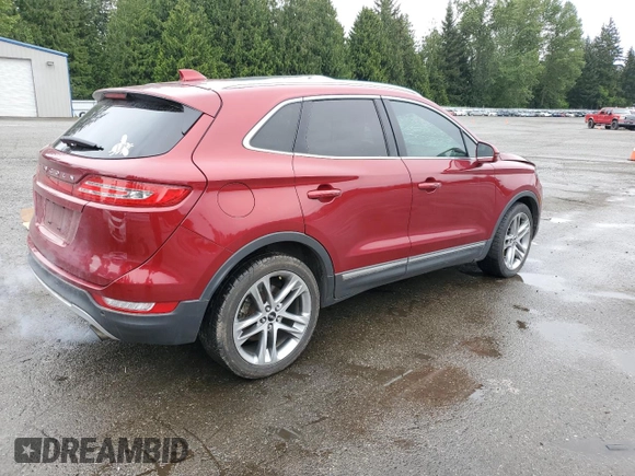 2015 Lincoln MKC z VIN 5LMTJ2AHXFUJ10820, wystawiony jako Copart lot #57139315 z przebiegiem 128 714 mil mil oraz Szkody całkowita. Historia ofert i sprzedaży dostępna na DreamBid. Obrazek 3.