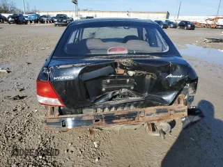 2002 Hyundai Accent z VIN KMHCF35G22U174792, wystawiony jako Copart lot #47281545 z przebiegiem 273 228 mil mil oraz Szkoda całkowita • Salvage title. Historia ofert i sprzedaży dostępna na DreamBid. Obrazek 6.