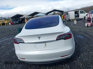 2018 Tesla Model 3 Long Range Battery with VIN 5YJ3E1EA3JF013253, listed as a IAAI auction lot 41752102 with 84,459 mi miles. Bid and sale history available at carsss.com. Image 16.