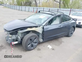 2020 Tesla Model 3 Long Range with VIN 5YJ3E1EB1LF639055, listed as a IAAI auction lot 42048009 with 43,493 mi miles. Bid and sale history available at carsss.com. Image 2.