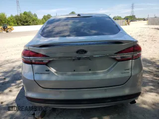 2018 Ford Fusion SE z VIN 3FA6P0HD3JR238137, wystawiony jako Copart lot #54828205 z przebiegiem 131 221 mil mil oraz Szkoda całkowita • Salvage title. Historia ofert i sprzedaży dostępna na DreamBid. Obrazek 6.
