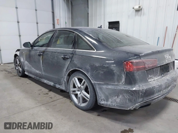 2016 Audi A6 Premium Plus z VIN WAUGFAFCXGN104249, wystawiony jako IAAI lot #41631393 z przebiegiem 117 516 mil mil oraz . Historia ofert i sprzedaży dostępna na DreamBid. Obrazek 3.