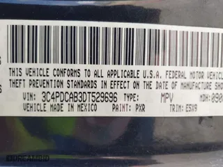 2013 Dodge Journey SE with VIN 3C4PDCAB3DT529696, listed as a IAAI auction lot 41885319 with 130,947 mi miles. Bid and sale history available at carsss.com. Image 9.
