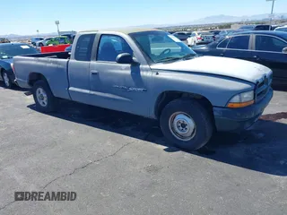 1999 Dodge Dakota SLT z VIN 1B7GL22X7XS220665, wystawiony jako IAAI lot #41820536 z przebiegiem Nie podano mil oraz . Historia ofert i sprzedaży dostępna na DreamBid. Obrazek 1.