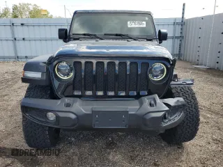 2023 Jeep Wrangler Willys with VIN 1C4HJXDG6PW663824, listed as a Copart auction lot 57761905 with 15,040 mi miles and Salvage title. Bid and sale history available at DreamBid. Image 5.