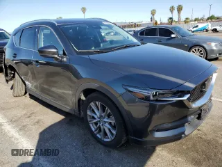 2019 Mazda CX-5 Grand Touring with VIN JM3KFADM2K0665356, listed as a Copart auction lot 51886685 with 44,760 mi miles and Salvage Title. Bid and sale history available at carsss.com. Image 4.