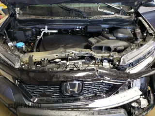 2021 Honda Passport Touring with VIN 5FNYF8H98MB012326, listed as a Copart auction lot 52165835 with 21,679 mi miles and Salvage Title. Bid and sale history available at carsss.com. Image 11.