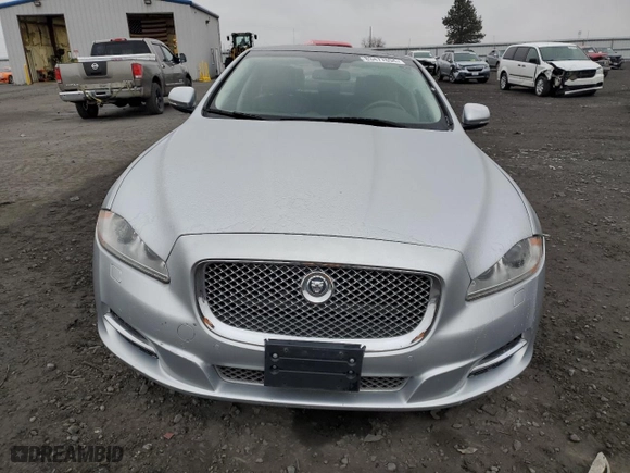 2013 Jaguar XJ with VIN SAJWA1C71D8V58597, listed as a Copart auction lot 83477694 with NaN miles and Clean Title. Bid and sale history available at carsss.com. Image 5.