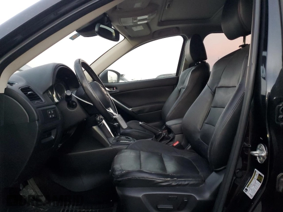 2014 Mazda CX-5 Grand Touring with VIN JM3KE4DY5E0386043, listed as a Copart auction lot 48866995 with 183,626 mi miles and Salvage Title. Bid and sale history available at DreamBid. Image 7.