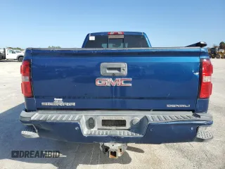 2017 GMC Sierra 3500HD Denali z VIN 1GT42YEY6HF158831, wystawiony jako Copart lot #74659734 z przebiegiem Nie podano mil oraz Nie do naprawy • Non repairable. Historia ofert i sprzedaży dostępna na DreamBid. Obrazek 6.