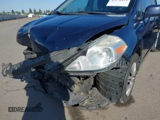 2009 Nissan Versa S with VIN 3N1BC11E49L493099, listed as a IAAI auction lot 42170459 with 209,788 mi miles and . Bid and sale history available at DreamBid. Image 18.