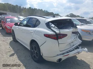 2020 Alfa Romeo Stelvio with VIN ZASPAJAN9L7C91080, listed as a IAAI auction lot 40416497 with 51,384 mi miles. Bid and sale history available at carsss.com. Image 3.