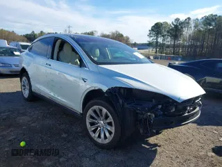 2018 Tesla Model X 75D with VIN 5YJXCDE28JF115455, listed as a IAAI auction lot 41878021 with 87,626 mi miles. Bid and sale history available at carsss.com. Image 1.
