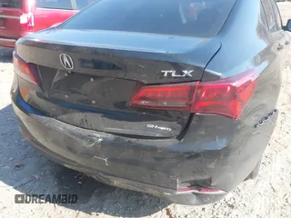 2015 Acura TLX V6 Tech with VIN 19UUB3F5XFA006165, listed as a IAAI auction lot 40686904 with 211,648 mi miles. Bid and sale history available at carsss.com. Image 6.