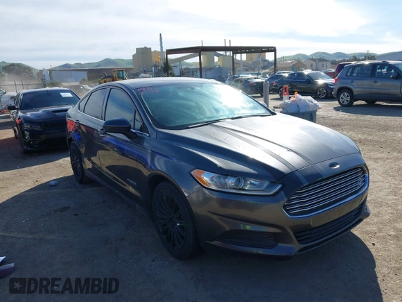 2015 Ford Fusion S Hybrid with VIN 3FA6P0UU2FR105754, listed as a IAAI auction lot 41631104 with 185,114 mi miles. Bid and sale history available at carsss.com. Image 1.
