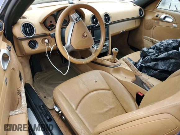 2005 Porsche Boxster с VIN WP0CA29875U713041, выставлен на аукционе Copart как лот 74948004 с пробегом Не указан миль и Списание • Salvage title. История ставок и продаж доступна на DreamBid. Изображение 8.