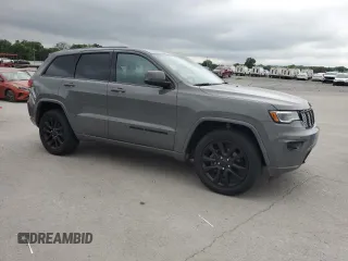 2020 Jeep Grand Cherokee Laredo E with VIN 1C4RJFAG7LC200931, listed as a Copart auction lot 62363875 with 58,151 mi miles and Salvage title. Bid and sale history available at DreamBid. Image 4.