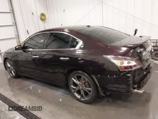 2014 Nissan Maxima SV z VIN 1N4AA5AP5EC910605, wystawiony jako IAAI lot #42082685 z przebiegiem 83 628 mil mil oraz . Historia ofert i sprzedaży dostępna na DreamBid. Obrazek 15.