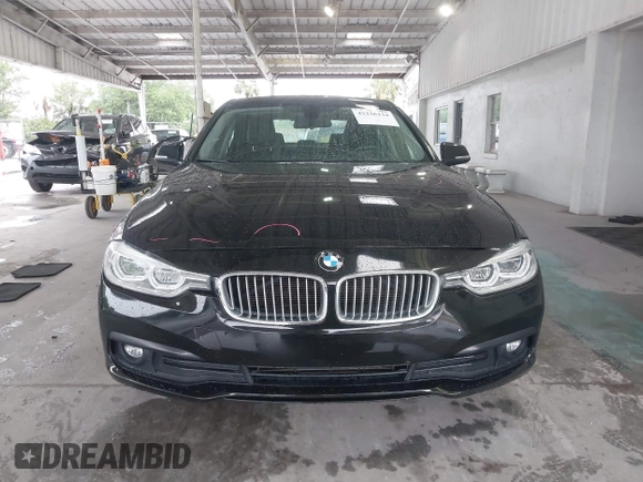 2018 BMW 3 Series 320i with VIN WBA8E1G54JNU90018, listed as a IAAI auction lot 42236134 with 73,589 mi miles and . Bid and sale history available at DreamBid. Image 13.