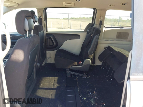2014 Dodge Grand Caravan SXT z VIN 2C4RDGCG4ER244762, wystawiony jako IAAI lot #42002269 z przebiegiem 117 896 mil mil oraz . Historia ofert i sprzedaży dostępna na DreamBid. Obrazek 8.