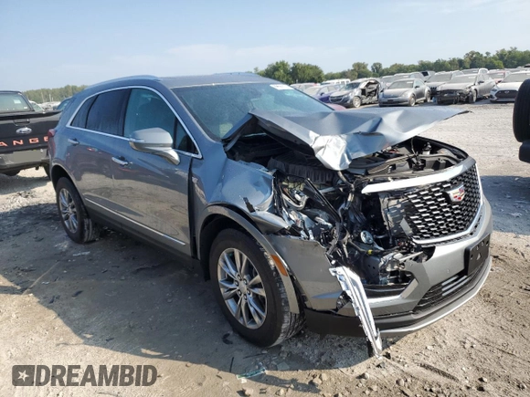2023 Cadillac XT5 AWD Premium Luxury with VIN 1GYKNDR40PZ152982, listed as a Copart auction lot 69569914 with 24,829 mi miles and Salvage Title. Bid and sale history available at DreamBid. Image 4.