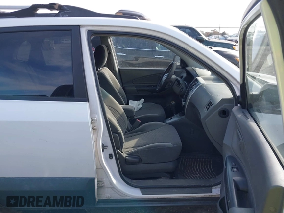 2007 Hyundai Tucson SE with VIN KM8JN12D07U638470, listed as a IAAI auction lot 41464634 with 203,283 mi miles. Bid and sale history available at carsss.com. Image 5.