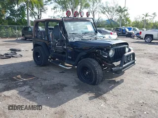 1997 Jeep Wrangler Sport z VIN 1J4FY19S5VP539283, wystawiony jako IAAI lot #41996476 z przebiegiem 131 593 mil mil oraz . Historia ofert i sprzedaży dostępna na DreamBid. Obrazek 1.