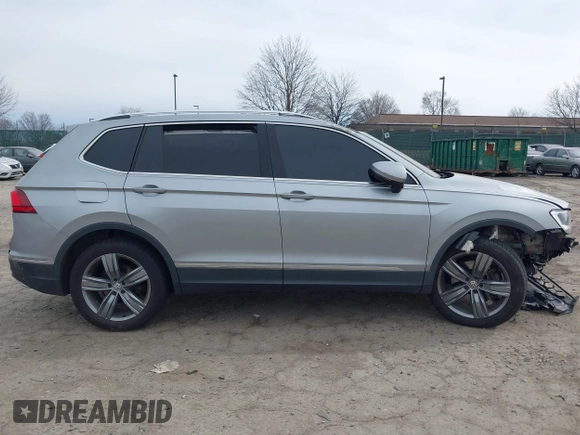 2020 Volkswagen Tiguan SE with VIN 3VV2B7AX6LM026760, listed as a IAAI auction lot 41652292 with 63,925 mi miles and . Bid and sale history available at DreamBid. Image 12.