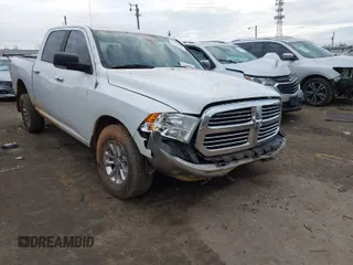 2013 Ram 1500 SLT z VIN 1C6RR6LG2DS665976, wystawiony jako IAAI lot #41465451 z przebiegiem 179 989 mil mil oraz . Historia ofert i sprzedaży dostępna na DreamBid. Obrazek 1.