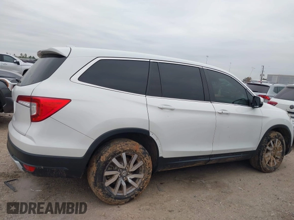 2020 Honda Pilot EX-L with VIN 5FNYF5H55LB029238, listed as a IAAI auction lot 41330490 with 116,787 mi miles. Bid and sale history available at carsss.com. Image 13.