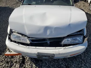 1996 Honda Accord DX with VIN 1HGCD5627TA044990, listed as a Copart auction lot 44457905 with 67,798 mi miles and Salvage Title. Bid and sale history available at carsss.com. Image 11.