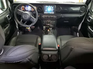2023 Jeep Wrangler Sport S with VIN 1C4HJXDN1PW628218, listed as a Copart auction lot 48355205 with 32,009 mi miles and Salvage title. Bid and sale history available at DreamBid. Image 8.